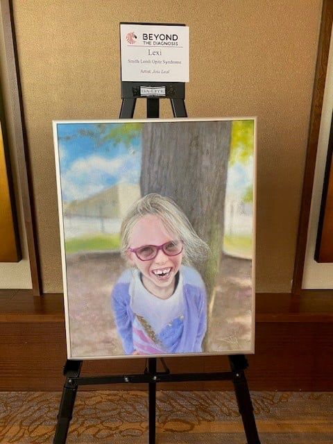 Painting of Lexi at the Beyond the Diagnosis exhibit